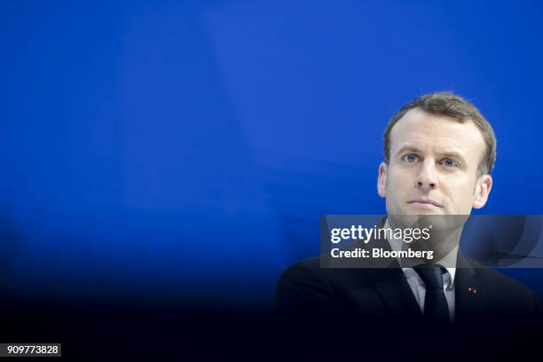 Emmanuel Macron, France's president, listens during a special address on day two of the World Economic Forum in Davos, Switzerland, on Wednesday,...