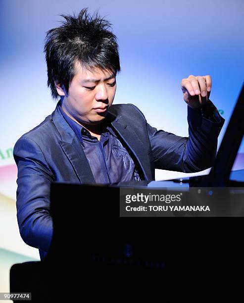 Chinese pianist Lang Lang performs during a music event for Japanese children in Tokyo on September 20, 2009. Lang is in Japan to appear in a series...