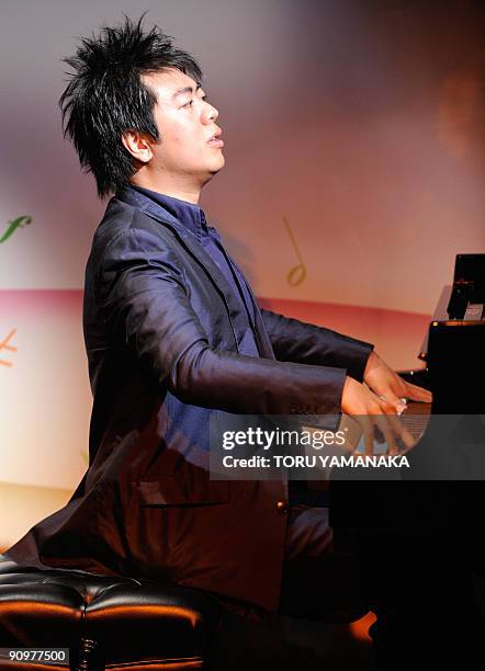 Chinese pianist Lang Lang performs during a music event for Japanese children in Tokyo on September 20, 2009. Lang is in Japan to appear in a series...