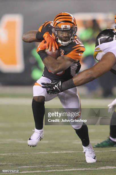 Giovani Bernard of the Cincinnati Bengals runs the football upfield during the game against the Pittsburgh Steelers at Paul Brown Stadium on December...