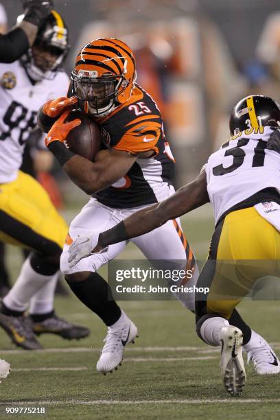 Giovani Bernard of the Cincinnati Bengals runs the football upfield during the game against the Pittsburgh Steelers at Paul Brown Stadium on December...