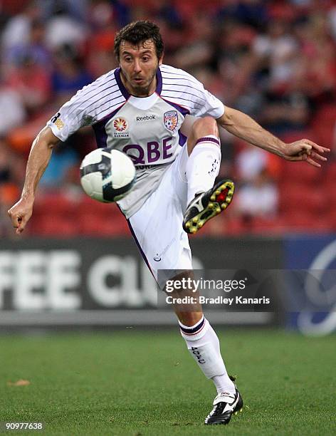 Naum Sekulovski of the Glory kicks the ball during the round seven A-League match between the Brisbane Roar and Perth Glory at Suncorp Stadium on...