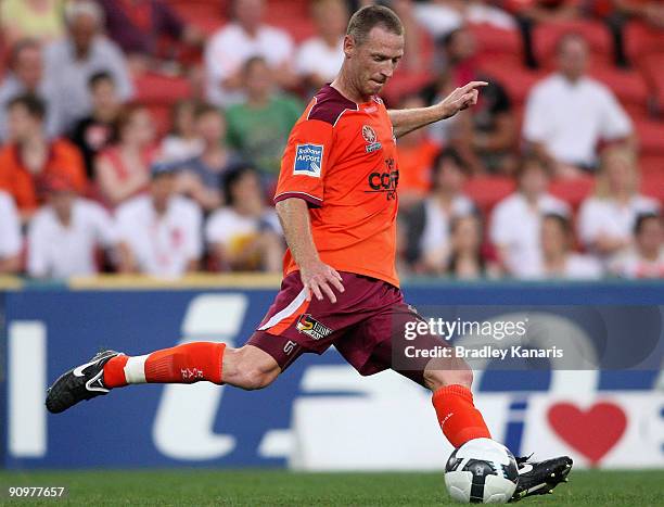 Craig Moore of the Roar kicks the ball during the round seven A-League match between the Brisbane Roar and Perth Glory at Suncorp Stadium on...