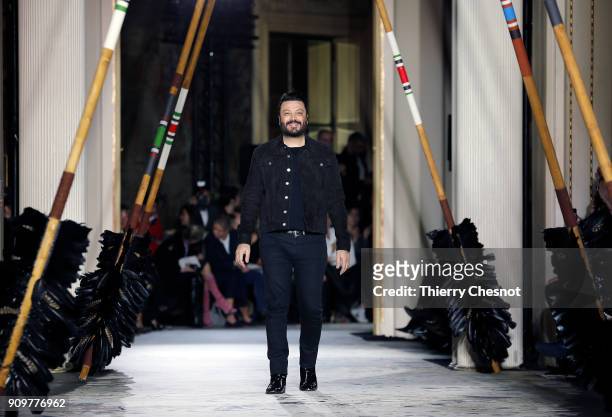 Lebanese designer Zuhair Murad acknowledges the audience at the end of the Zuhair Murad Spring Summer 2018 show as part of Paris Fashion Week on...