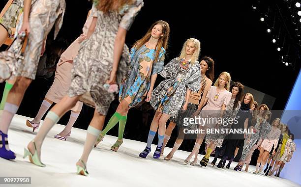 Models display outfits by designer Betty Jackson during Spring/Summer 2010 collection show on the third day of the London Fashion Week, in central...