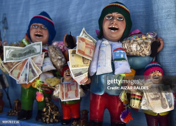 View of a Ekeko -Aymara god of abundance- statuettes during the inauguration of the Alasitas Fair in La Paz on January 24, 2018. In this and other...