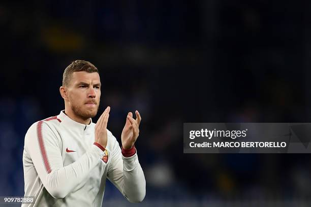 Roma's forward Edin Dzeko from Bosnia-Herzegovina cheers during the warm up prior to the Italian Serie A football match between Sampdoria and Roma on...