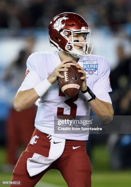 Washington State Cougars quarterback Tyler Hilinski back to pass in the first half of the Holiday Bowl played against the Michigan State Spartans, on...