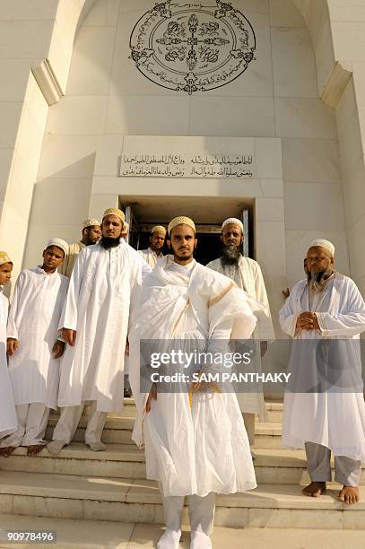 Dawoodi Bohra community's Janaab Al Aqmar bs bin shz Qusai bs Vajihuddin DM poses with others as they observe Eid at Syedna Qutbuddin Sshahid RA Roza...