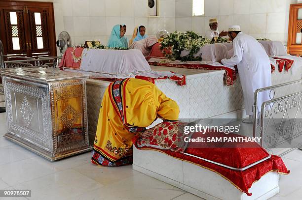 Dawoodi Bohra devotees pray at the mazars of Royal Family members at Syedna Qutbuddin Sshahid RA Roza as they observe Eid in Ahmedabad on September...