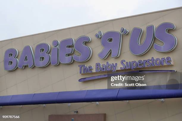 Sign hangs above a Babies "R" Us store on January 24, 2018 in Chicago, Illinois. The store is one of more than 180 stores that the parent company,...