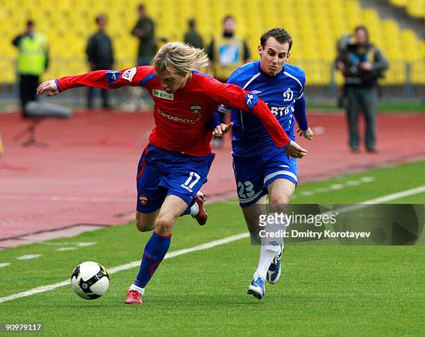 Milos Krasic of PFC CSKA Moscow battles for the ball with Luke Wilkshire of FC Dynamo Moscow during the Russian Football League Championship match...