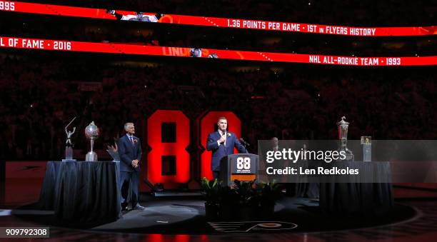 Hall of Famer and former Philadelphia Flyer Eric Lindros speaks to the crowd during his Jersey Retirement Night ceremony with Flyer President Paul...