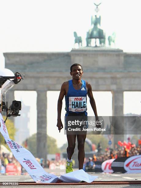 Haile Gebrselassie celebrates after winning the 36th Berlin Marathon on September 20, 2009 in Berlin, Germany.