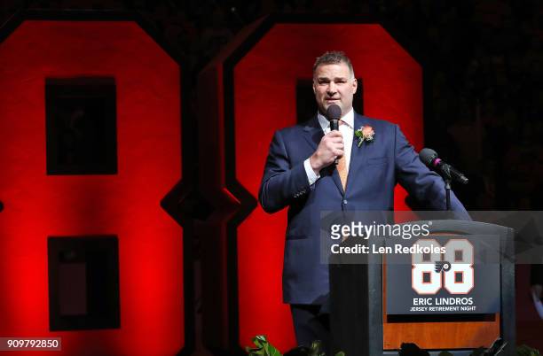 Hall of Famer and former Philadelphia Flyer Eric Lindros speaks to the crowd during his Jersey Retirement Night ceremony, prior to a NHL game between...