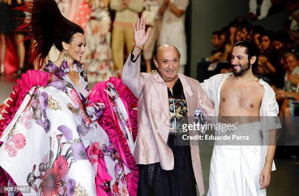 Designer Francis Montesinos -center- and dancer Rafael Amargo walks the runway in the Francis Montesinos show during Cibeles Madrid Fashion Week...