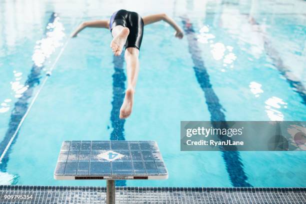 boy in pool for swim practice - diving platform stock pictures, royalty-free photos & images