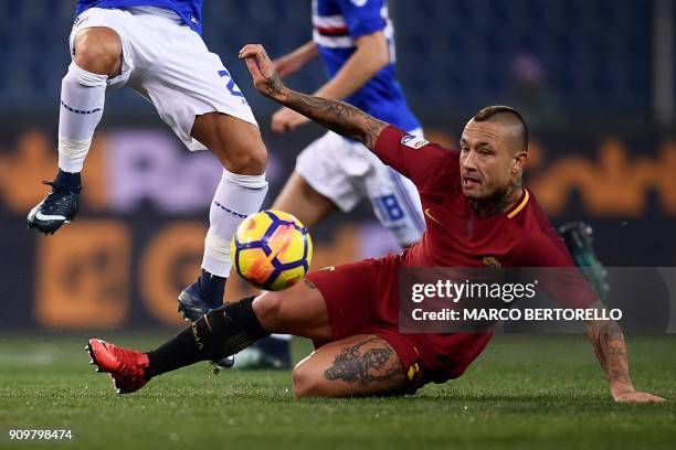 Roma's midfielder Radja Nainggolan from Belgium vies with a Sampdoria's player during the Italian Serie A football match between Sampdoria and Roma...