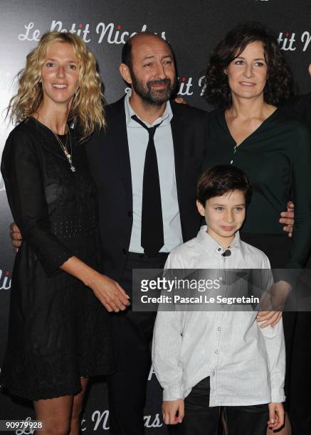 Actresses Sandrine Kiberlain , Valerie Lemercier and actor Kad Merad attend the Premiere of "Le Petit Nicolas" film at Le Grand Rex on September 20,...