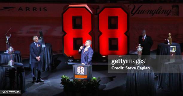 Hall of Famer and former Philadelphia Flyer Eric Lindros speaks to the crowd during his Jersey Retirement Night ceremony with Flyer President Paul...