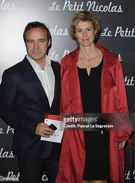 Personality Anne Richard and Fabien Lecoeuvre attend the Premiere of "Le Petit Nicolas" film at Le Grand Rex on September 20, 2009 in Paris, France.