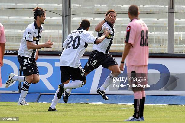 Cristian Zaccardo of Parma and his mates celebrate a goal as Manuele Blasi of Palermo looks on during Serie A match played between Parma FC and US...