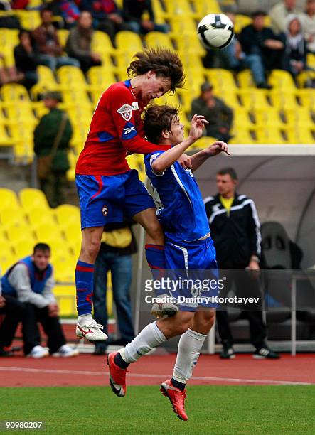 Georgi Schennikov of PFC CSKA Moscow battles for the ball with Aleksandr Kokorin of FC Dynamo Moscow during the Russian Football League Championship...