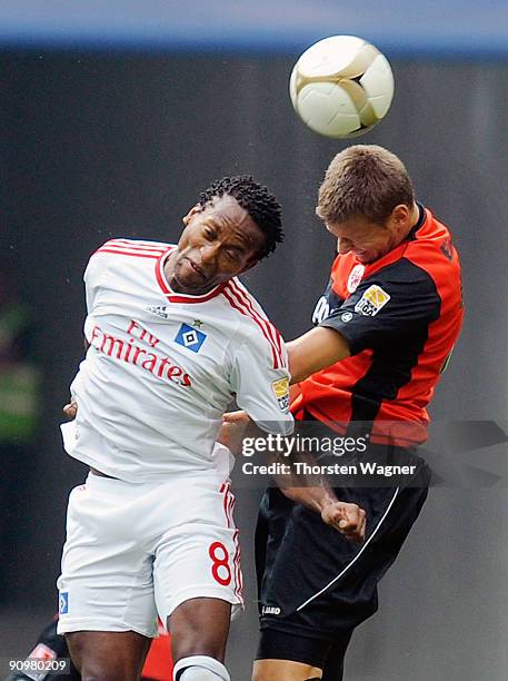 Marco Russ of Frankfurt battles for the ball with Ze Roberto of Hamburg during the Bundesliga match between Eintracht Frankfurt and Hamburger SV at...