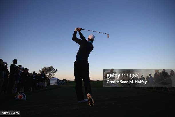 Tiger Woods hits a shot on the third hole during the pro-am round of the Farmers Insurance Open at Torrey Pines Golf Course on January 24, 2018 in...