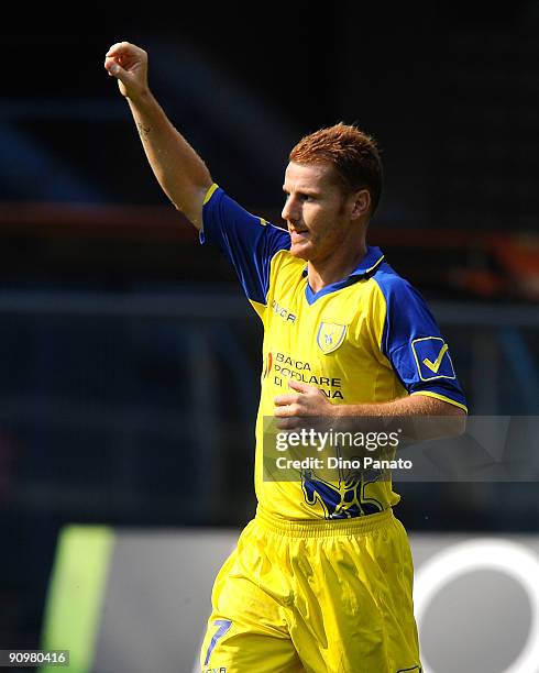 Michele Marcolini of Chievo Verona celebrates after scoring the opening goal of the Serie A match between AC Chievo Verona and Genoa CFC at Stadio...