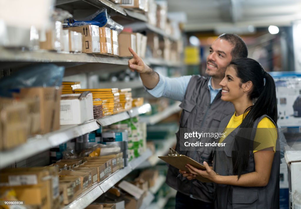 People working at a hardware store