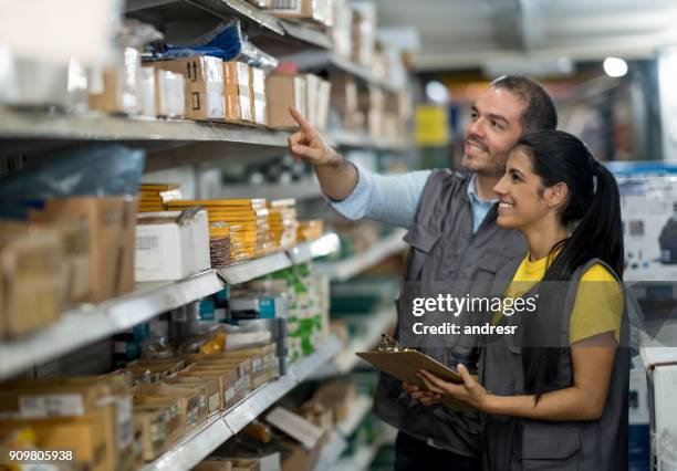 people working at a hardware store - stationary stock pictures, royalty-free photos & images