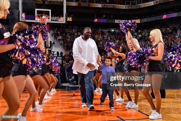 As part of their 50th season celebration the Phoenix Suns honor former player Oliver Miller before the game against the Houston Rockets on January...