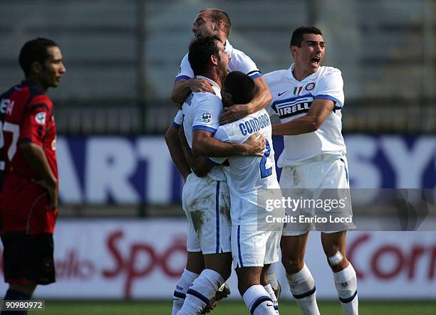 Alberto Diego Milito of Inter Milan is congratualted after scoring against during the Serie A match between Cagliari and Inter Milan at Stadio...