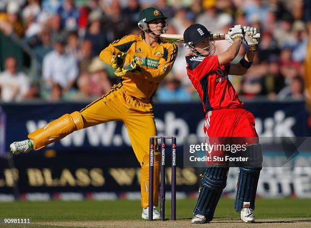 England batsman Joe Denly hits a ball to the boundary watched by Tim Paine during the 7th NatWest ODI between England and Australia at The Riverside...