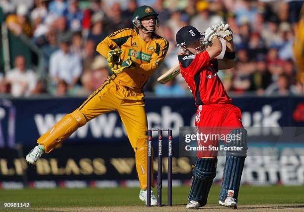 England batsman Joe Denly pulls a ball to the boundary watched by Tim Paine during the 7th NatWest ODI between England and Australia at The Riverside...