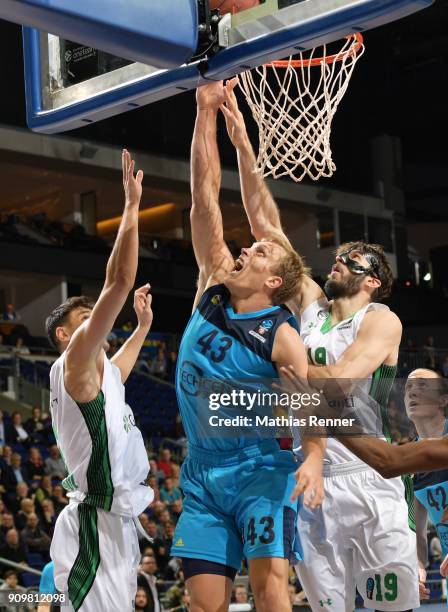 Muhammed Baygul of Daruessafaka Istanbul, Luke Sikma of Alba Berlin and Furkan Aldemir of Daruessafaka Istanbul during the game between Alba Berlin...