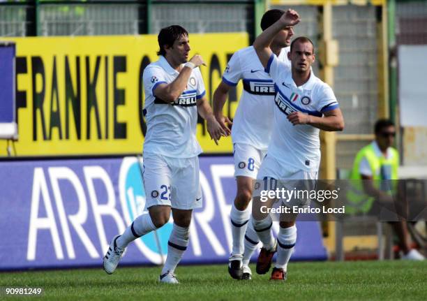 Diego Milito of Internazionale Milano celebrates after scoring a goal with Wesley Sneijder after scoring a goal during the Serie A match between...