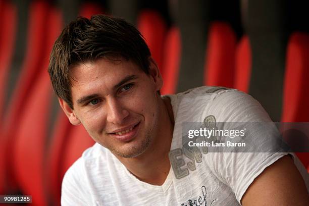 Injured player Patrick Helmes of Leverkusen smiles prior to the Bundesliga match between Bayer Leverkusen and Werder Bremen at BayArena on September...