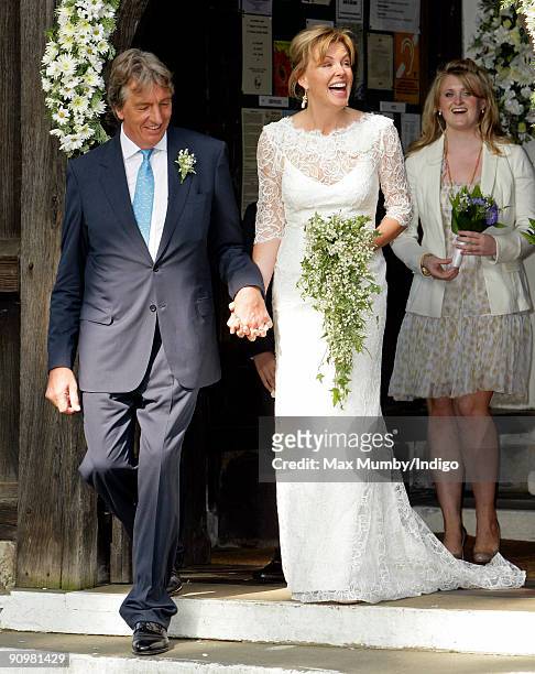 Nick Cook and Eimear Montgomerie, ex-wife of golfer Colin Montgomerie leaves St. Nicholas Church after their wedding on September 20, 2009 in...