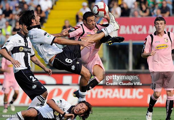 Alessandro Lucarelli of Parma and Fabrizio Miccoli of Palermo battle for the ball during the Serie A match between Parma F.C. And Palermo U.S. At...