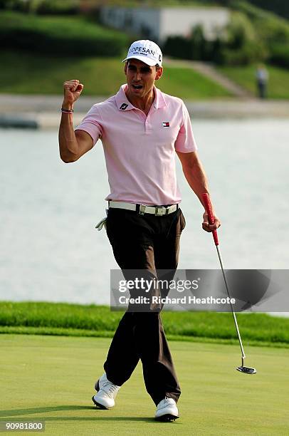Rafael Cabrera-Bello of Spain celebrates as he holes a birdie putt on the 18th green to shoot 60 and seal a 1 shot victory during the fourth round of...
