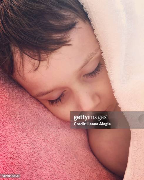 beach nap - leana alagia stock pictures, royalty-free photos & images
