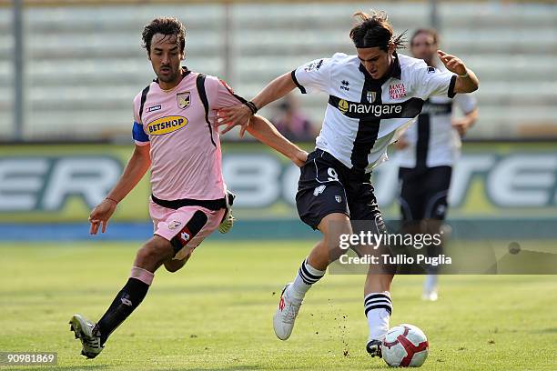 Mattia Cassani of Palermo and Davide Lanzafame of Parma battle for the ball during Serie A match played between Parma FC and US Citta di Palermo at...