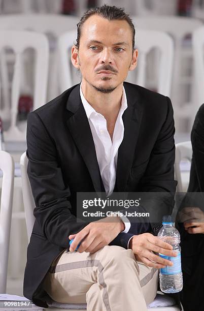 Designer Matthew Williamson sits on the front row at the Matthew Williamson Spring/Summer 2010 show at Howick Place during London Fashion Week on...