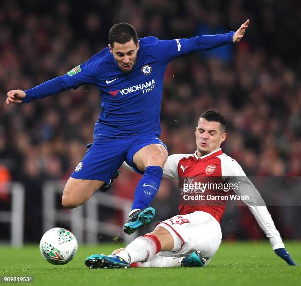 Granit Xhaka of Arsenal tackles Eden Hazard of Chelsea during the Carabao Cup Semi-Final Second Leg at Emirates Stadium on January 24, 2018 in...