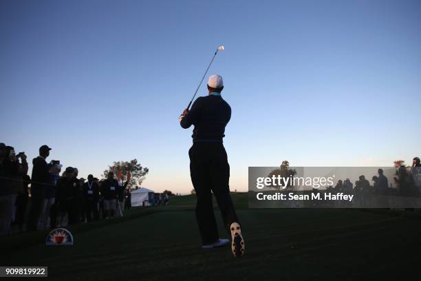 Tiger Woods hits a shot on the third hole during the pro-am round of the Farmers Insurance Open at Torrey Pines Golf Course on January 24, 2018 in...