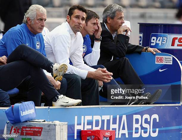Head coach Lucien Favre of Berlin and Manager Michael Preetz of Berlin look on during the Bundesliga match between Hertha BSC Berlin and SC Freiburg...