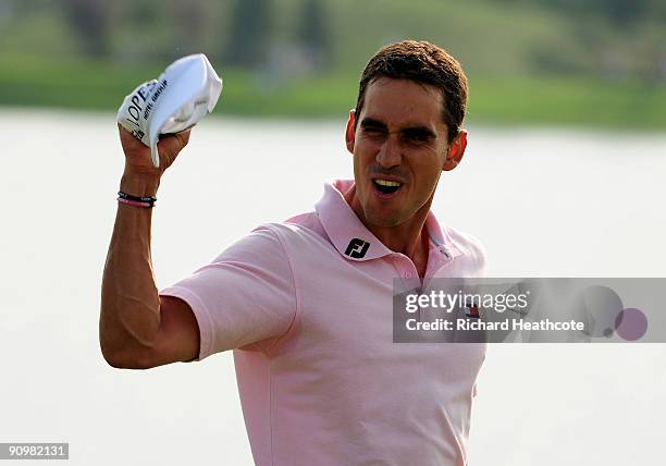 Rafael Cabrera-Bello of Spain celebrates as he holes a birdie putt on the 18th green to shoot 60 and seal a 1 shot victory during the fourth round of...