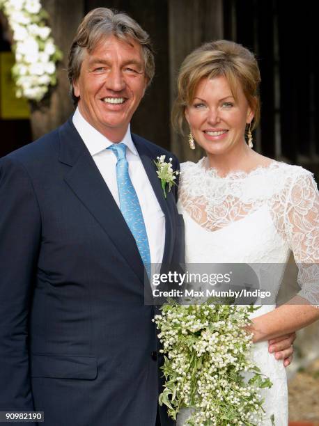 Nick Cook and Eimear Montgomerie leave St. Nicholas Church after their wedding on September 20, 2009 in Cranleigh, England.